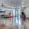 Open fitness center with yoga balls and stationary bikes